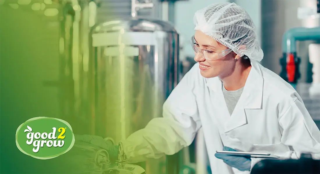 bottling plant employee working on product